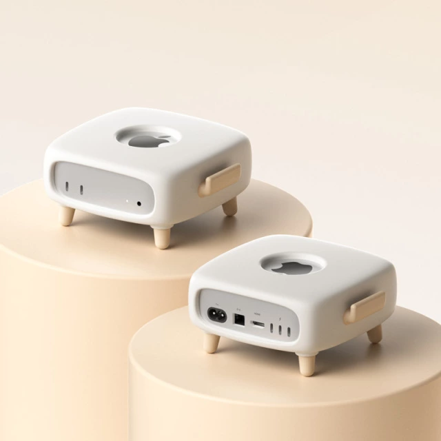 Protective enclosure surrounding a Mac mini M4